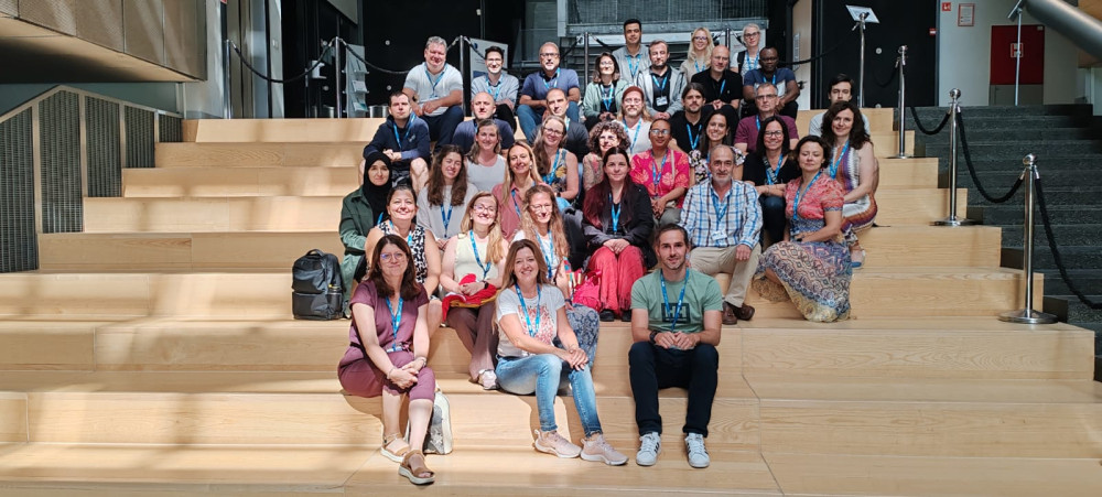 participants sitting on the stairs