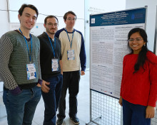 Anuradha Tonipe explaining her research to other participants