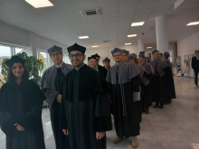 PhDs with their supervisors and the Faculty Council